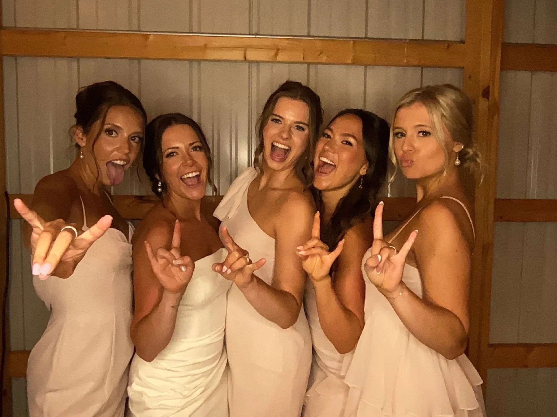 Bridesmaids posing in the photo booth